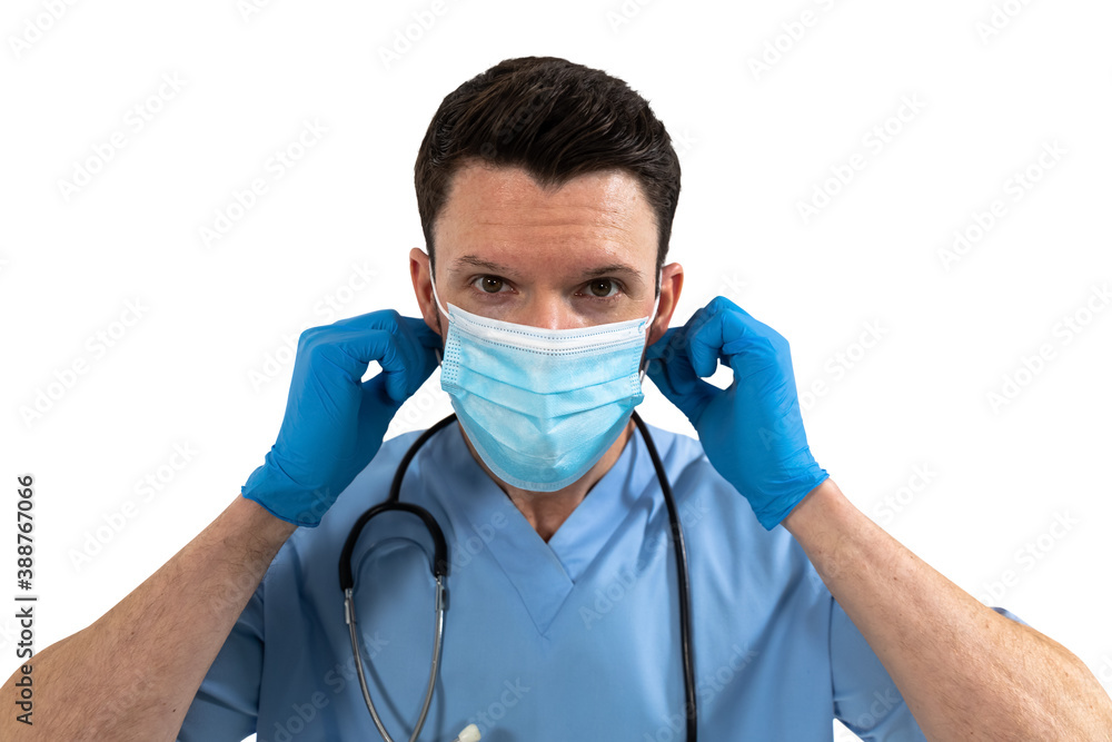 Portrait of male surgeon wearing face mask against white background Portrait of male surgeon wearing face mask against white background
