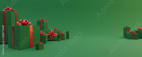 green background panoramic view with red green gifts  copy space  many gifts collected from the side   christmas gift card 