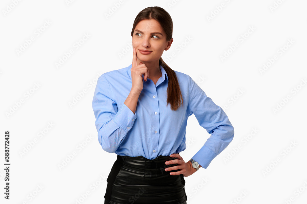 Pensive businesswoman in blue shirt on white isolated background Pensive businesswoman in blue shirt on white isolated background