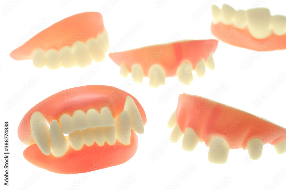 Fototapeta premium Sets of Novelty Teeth on a White Background