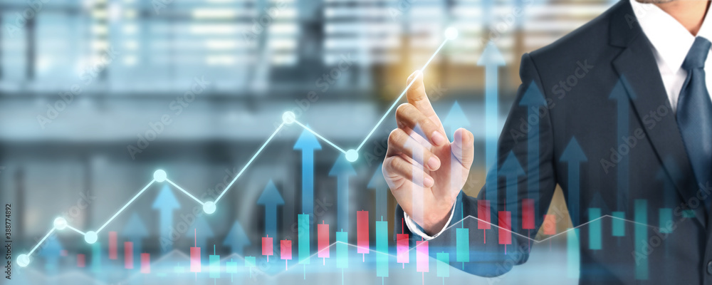 Businessman plan graph growth increase of chart positive indicators in his business Businessman plan graph growth increase of chart positive indicators in his business