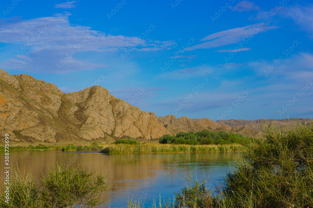 Beautiful landscape, steppe, river and mountains.