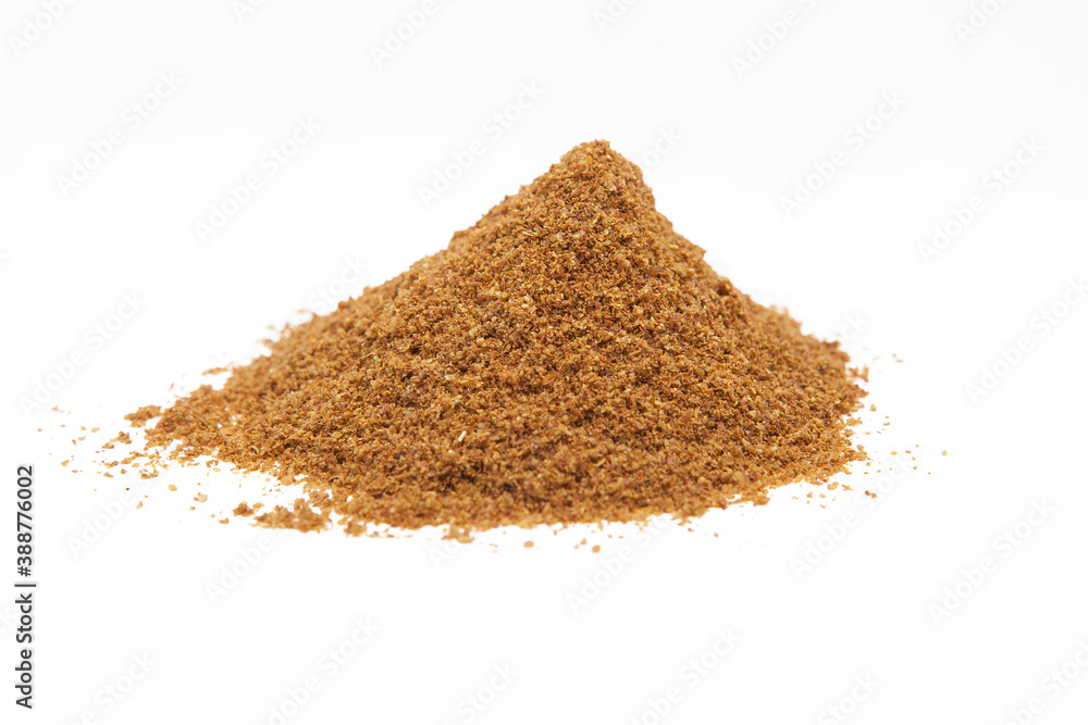Stack of cumin on a white background.
Stack of cumin on a white background.