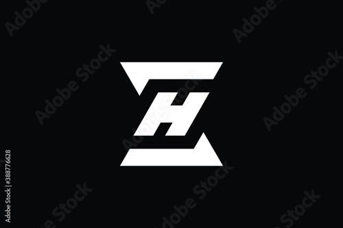 ZH logo letter design on luxury background. HZ logo monogram initials letter concept. ZH icon logo design. HZ elegant and Professional letter icon design on black background. H Z ZH HZ