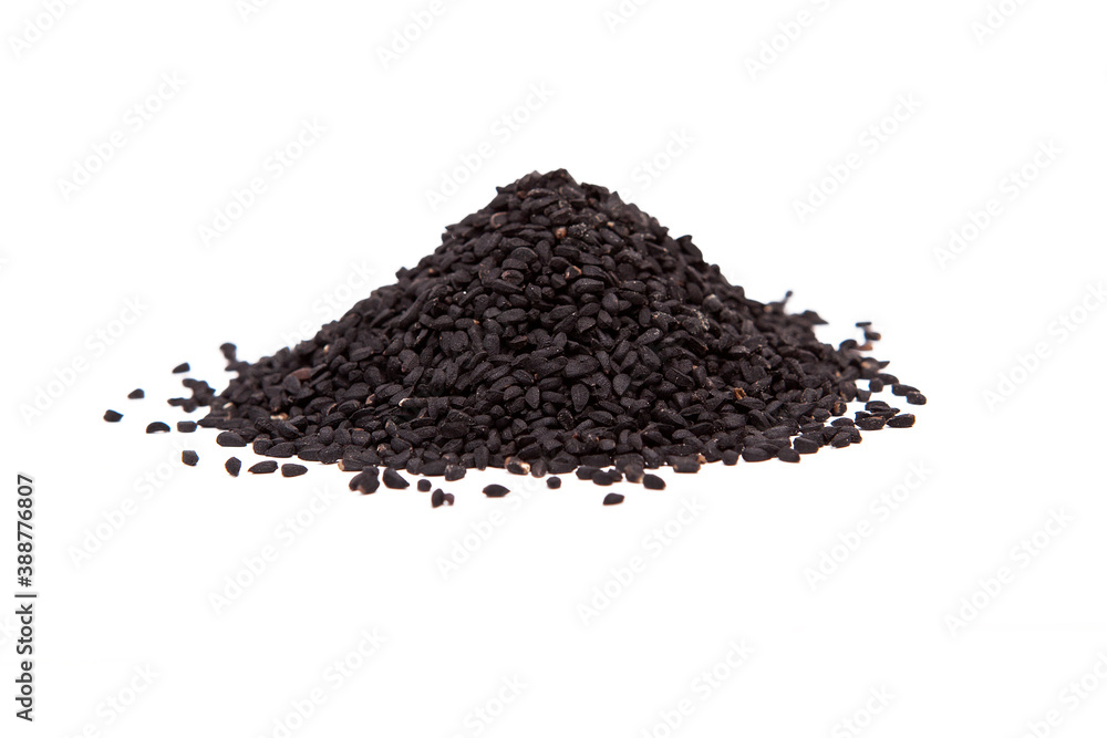 Stack of black cumin seedson a white background.
Stack of black cumin seedson a white background.