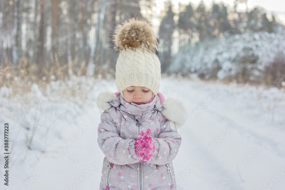 Portrait of little girl is snowy forest in winter. Portrait of little girl is snowy forest in winter.