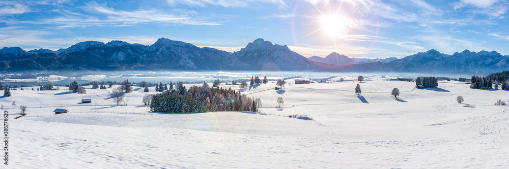 panoramic landscape at winter with alps mountains in Bavaria