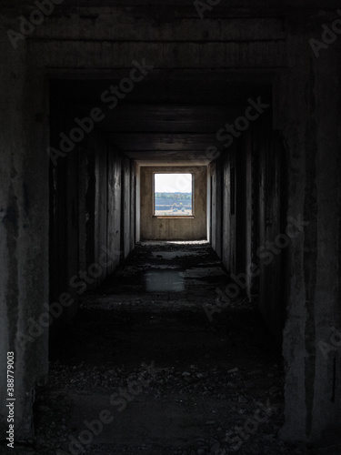 Fototapeta Naklejka Na Ścianę i Meble -  Window outside from weathered abandoned floor way