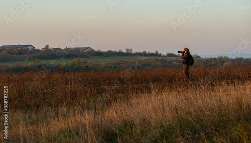 photographer taking pictures in nature © pellephoto