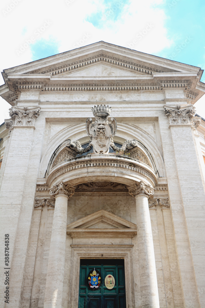 Architectural details and baroque ornaments in marble and travertine of the Church of Sant'Andrea al Quirinale.
