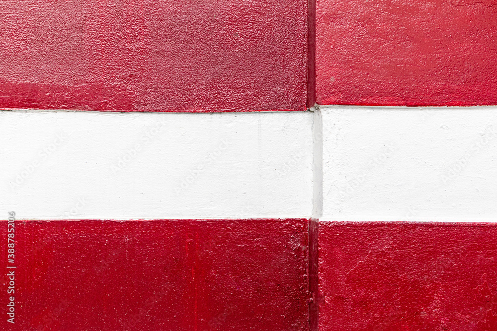 White and red concrete wall in the city. White and red concrete wall in the city.