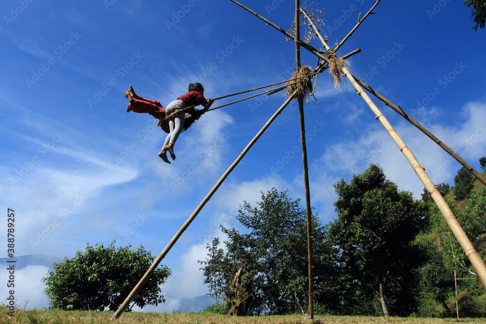 A traditional bamboo swing in Nepal. During the Hindu festival Dashain ...