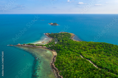 Tropical beach with turquoise ocean in paradise island. Aerial view. Paradise resort.