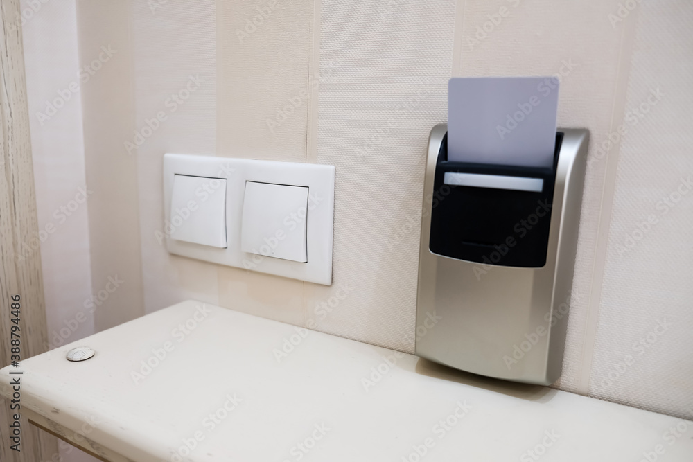 Closeup view of a security key card that controls power in a hotel room