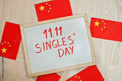 Chinese singles day theme. Board with China flags. photo