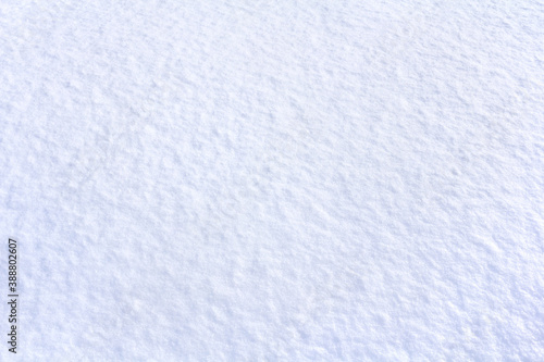 Fresh white blue snow in winter. Snowy surface, background, texture