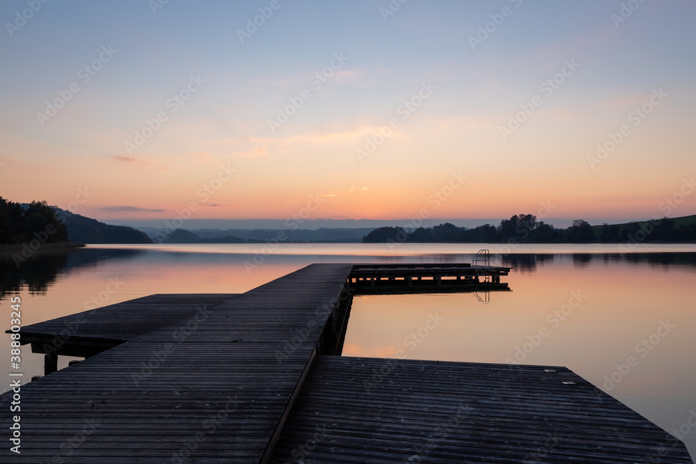 beautiful sunset at the lake mattsee, austria