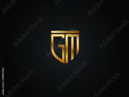 GM shield shape Gold Color logo Design