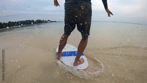 
Practicing Skimboard water sport on the beach. The guy falls from the skimboard in slow motion 4k
samet thailand photo