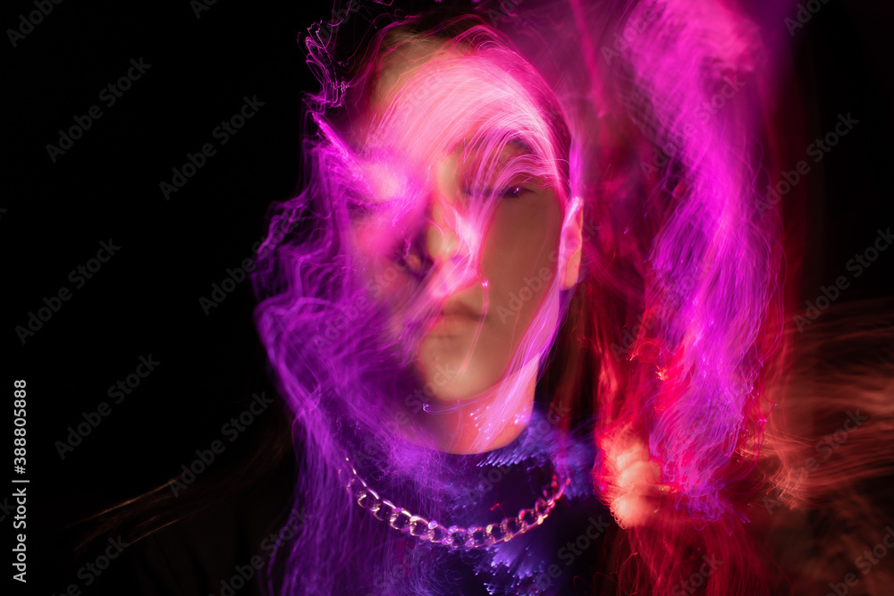 Portrait in the style of light painting. Long exposure photo Portrait in the style of light painting. Long exposure photo