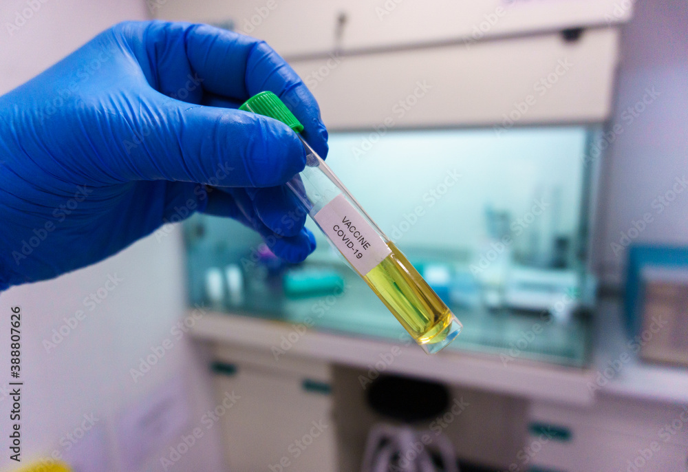 laboratory specialized in analysis of coronavirus, antibodies, covid vaccine, technician in analysis, machinery for covid-19, test tubes, surgical mask, work, autoclave machine, centrifugal machine laboratory specialized in analysis of coronavirus, antibodies, covid vaccine, technician in analysis, machinery for covid-19, test tubes, surgical mask, work, autoclave machine, centrifugal machine