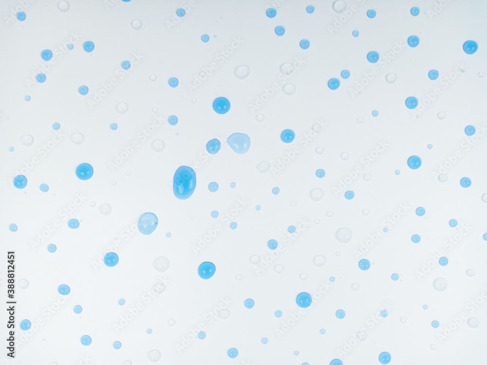 Clear and blue water drops on white background. Clear and blue water drops on white background.