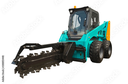 Chain trencher fixed on skid steer loader ( isolated on a white background ). To dig trenches, typically for laying pipes and cables, and for drainage.