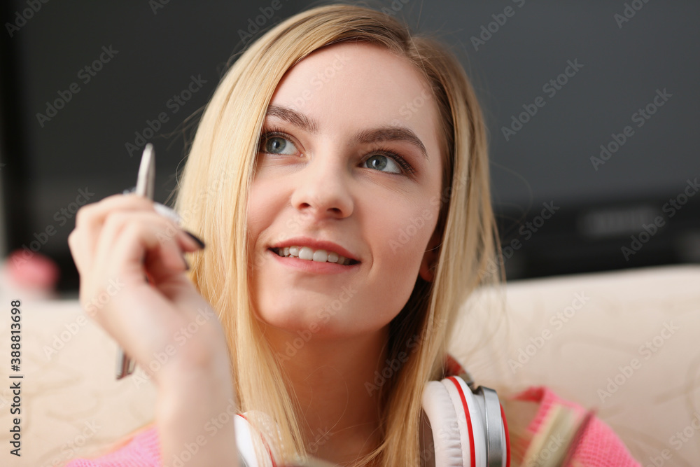 Fototapeta premium young beautiful woman fill in your personal diary bright impressions concept