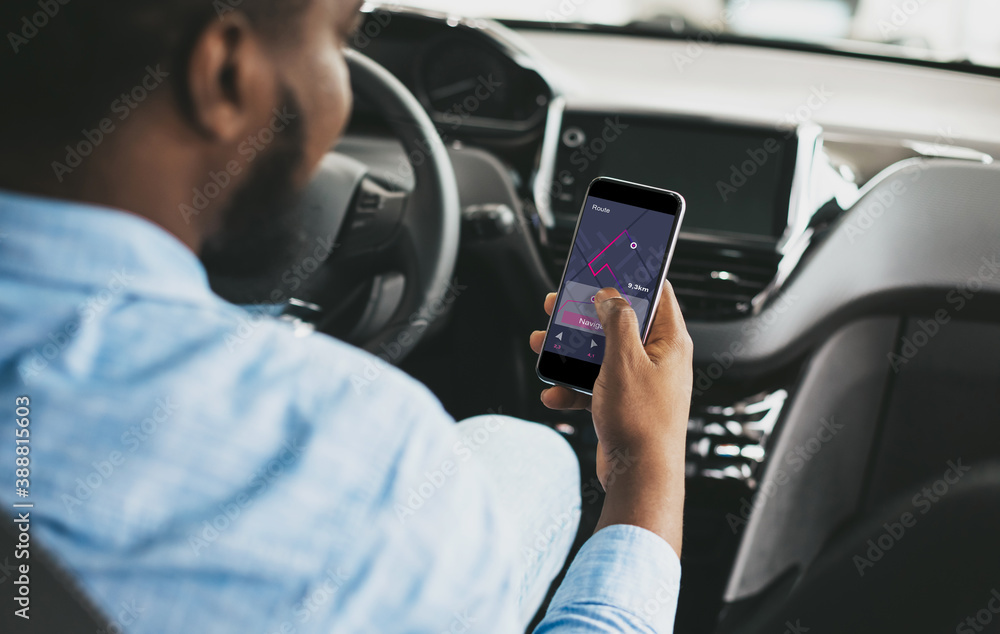 African Driver Using Smartphone With Car Navigation App Driving Auto African Driver Using Smartphone With Car Navigation App Driving Auto