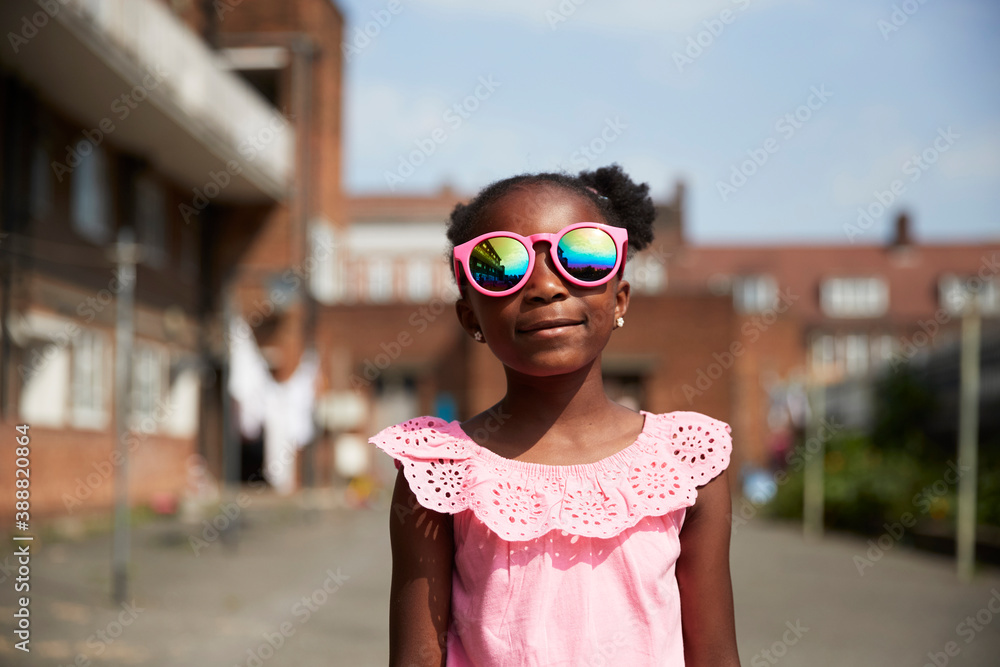 Portrait cute girl in bright pink sunglasses Stock Photo | Adobe Stock