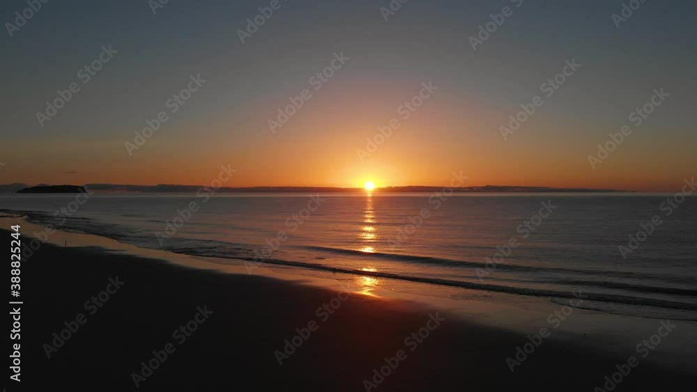 Amazing sunrise over sea horizon at Metadouro beach, Portugal. Aerial forward Amazing sunrise over sea horizon at Metadouro beach, Portugal. Aerial forward