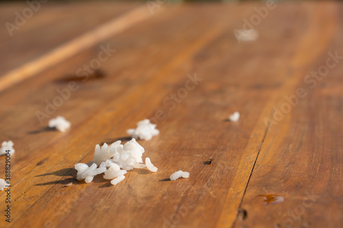 Spilled rice on the wooden floor