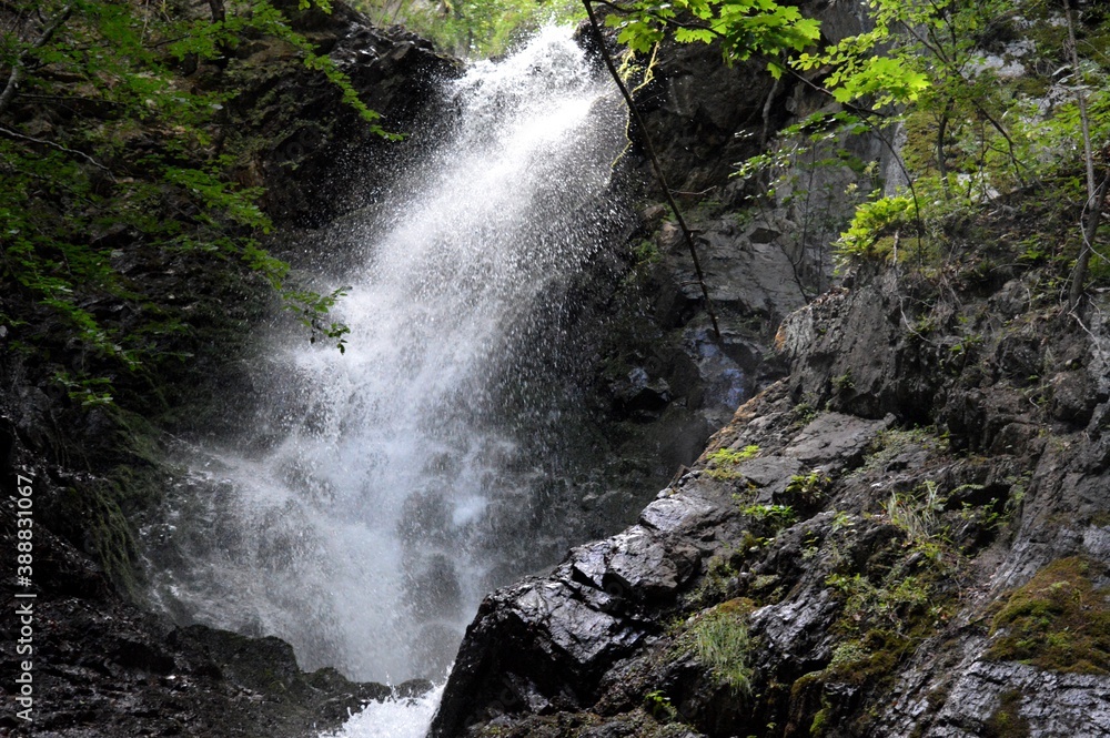 Fototapeta premium a large natural mountain waterfall