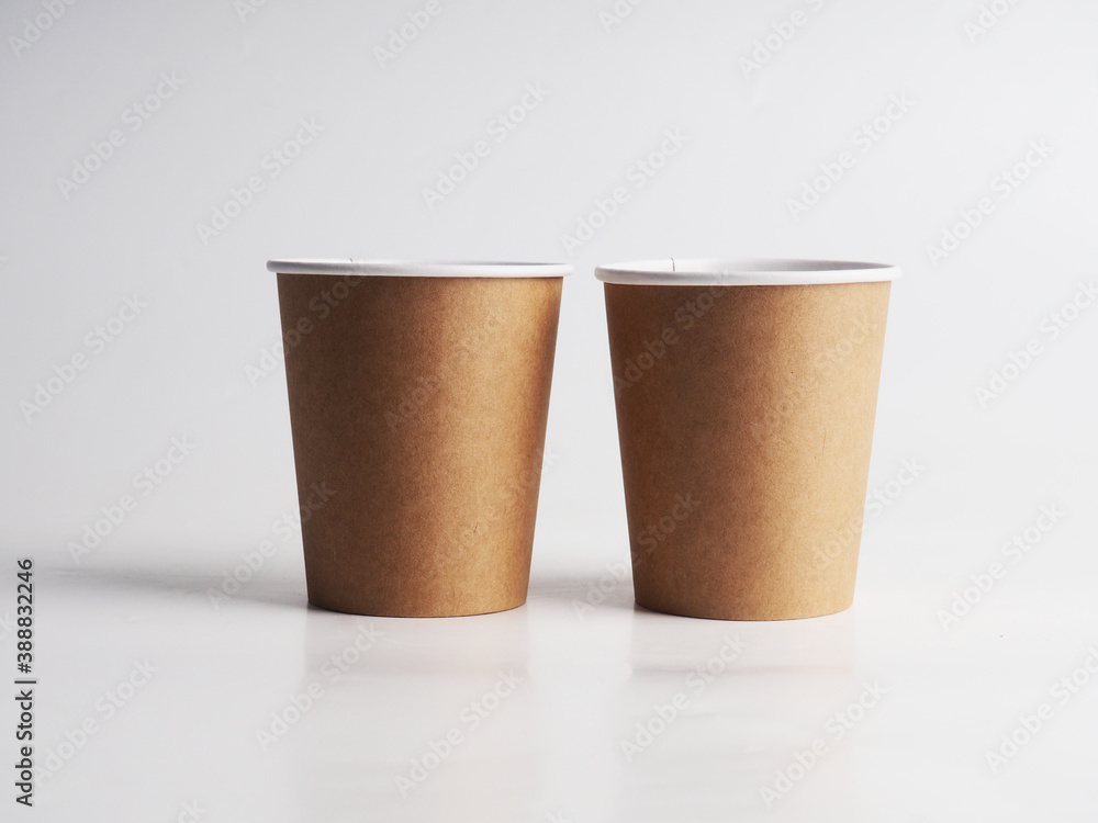 a few empty paper cups. Zero waste concept, paper tableware. Paper cup. Recycling. Eco-friendly disposable tableware. Eco dishes. a few empty paper cups. Zero waste concept, paper tableware. Paper cup. Recycling. Eco-friendly disposable tableware. Eco dishes.