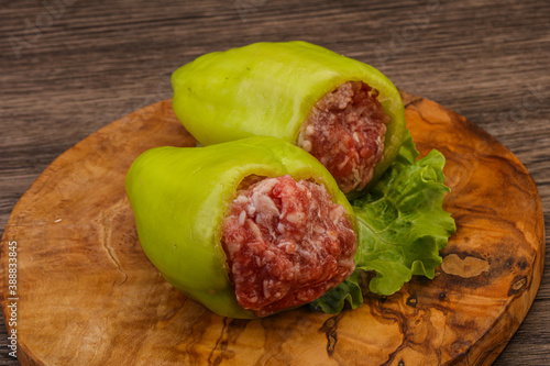 Raw stuffed bell pepper with meat