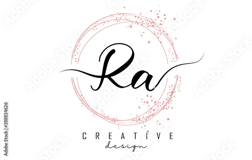 Handwritten RA R A letter logo with sparkling circles with pink glitter.