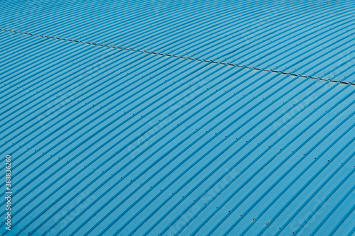 Old blue corrugated metal cladding on roof