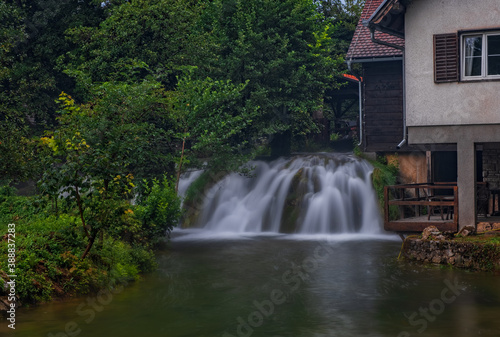 Little waterfall on Korana river canyon in village of Rastoke. Slunj in Croatia. Near Plitvice Lakes National Park. August 2020  long exposure picture.