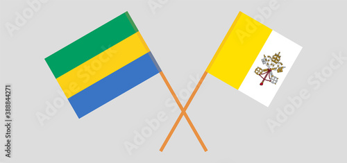 Crossed flags of Gabon and Vatican
