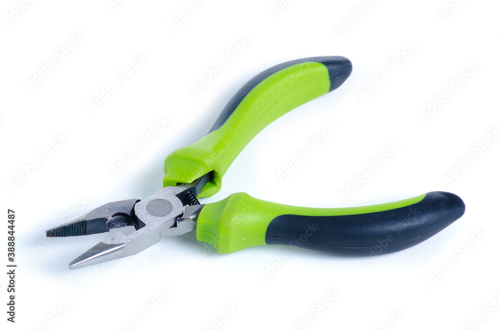 Obraz premium Green pliers work tool on white background isolation