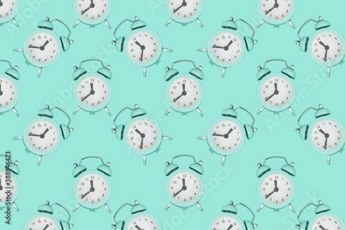 Background from alarm clocks. Antique alarm clocks. Pattern. Top view.