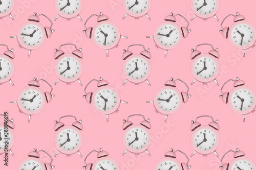 Background from alarm clocks. Antique alarm clocks. Pattern. Top view.