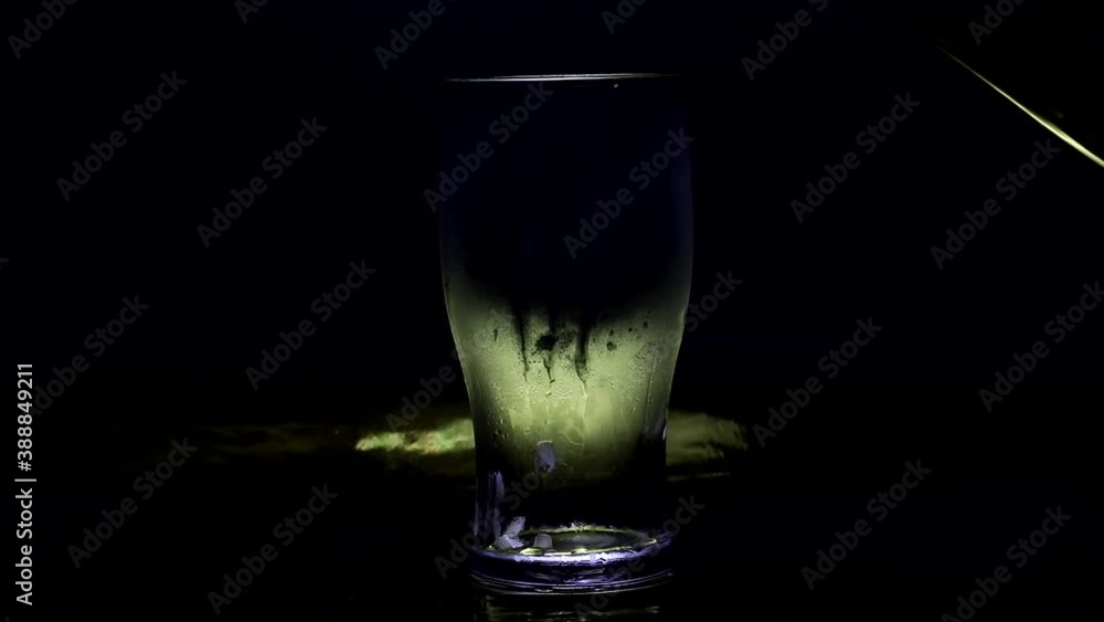 vidio open beer and pour into a glass. vidio open beer and pour into a glass.