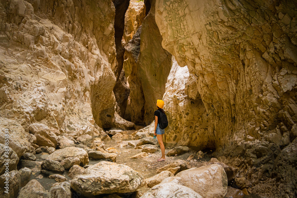 Young woman traveler exploring Saklikent Canyon, Southern Turkey Young woman traveler exploring Saklikent Canyon, Southern Turkey