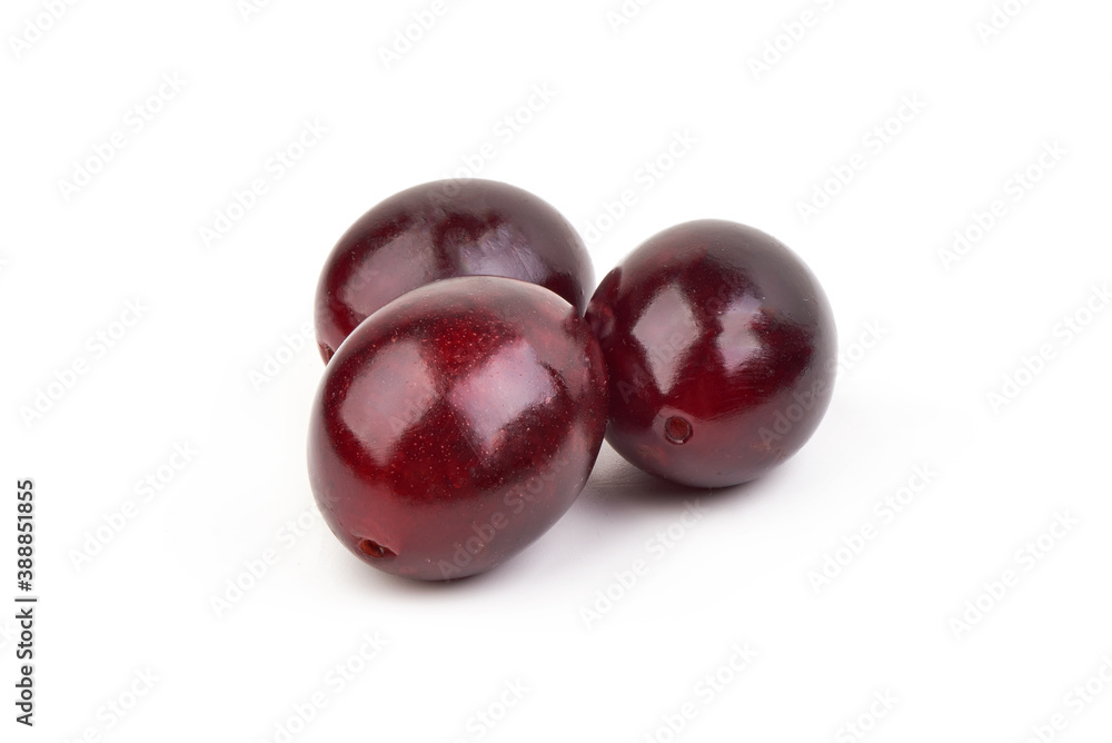 Fresh juicy plums, isolated on white background