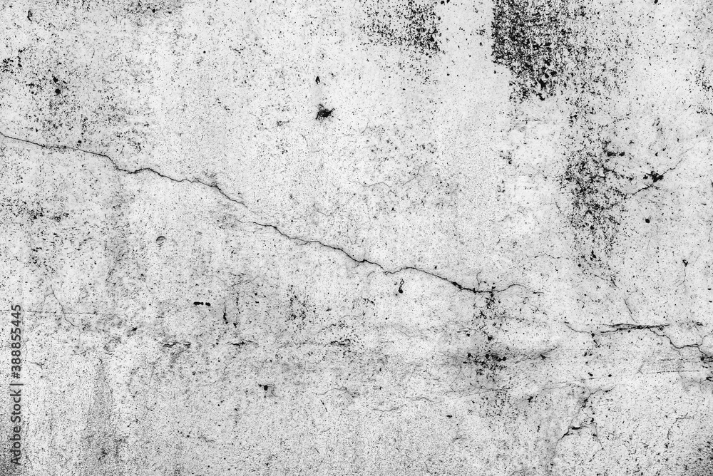 Fototapeta premium Texture of a concrete wall with cracks and scratches which can be used as a background