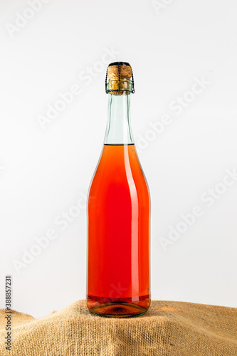 Canvas Print Glass bottle of sparkling rosé lambrusco wine