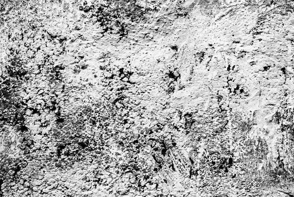 Fototapeta premium Texture of a concrete wall with cracks and scratches which can be used as a background