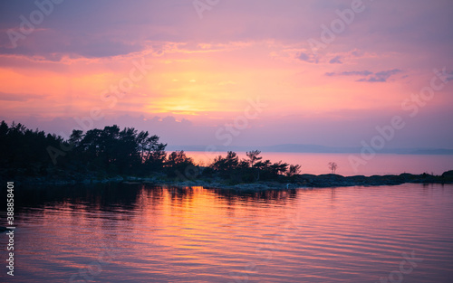 Beautiful sunset over a bay in the Baltic Sea © Simon