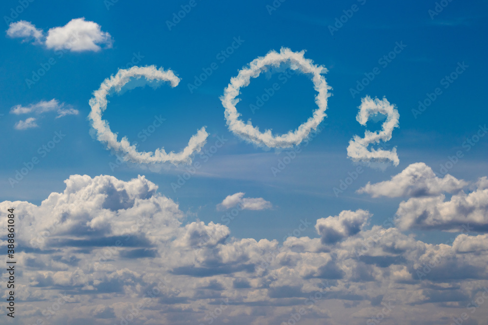 CO2 written by clouds in the sky. Environmental pollution, concept